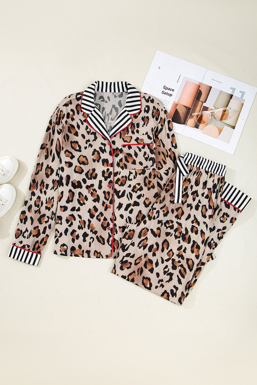Leopard print pajama set with striped shirt and pants on a light background