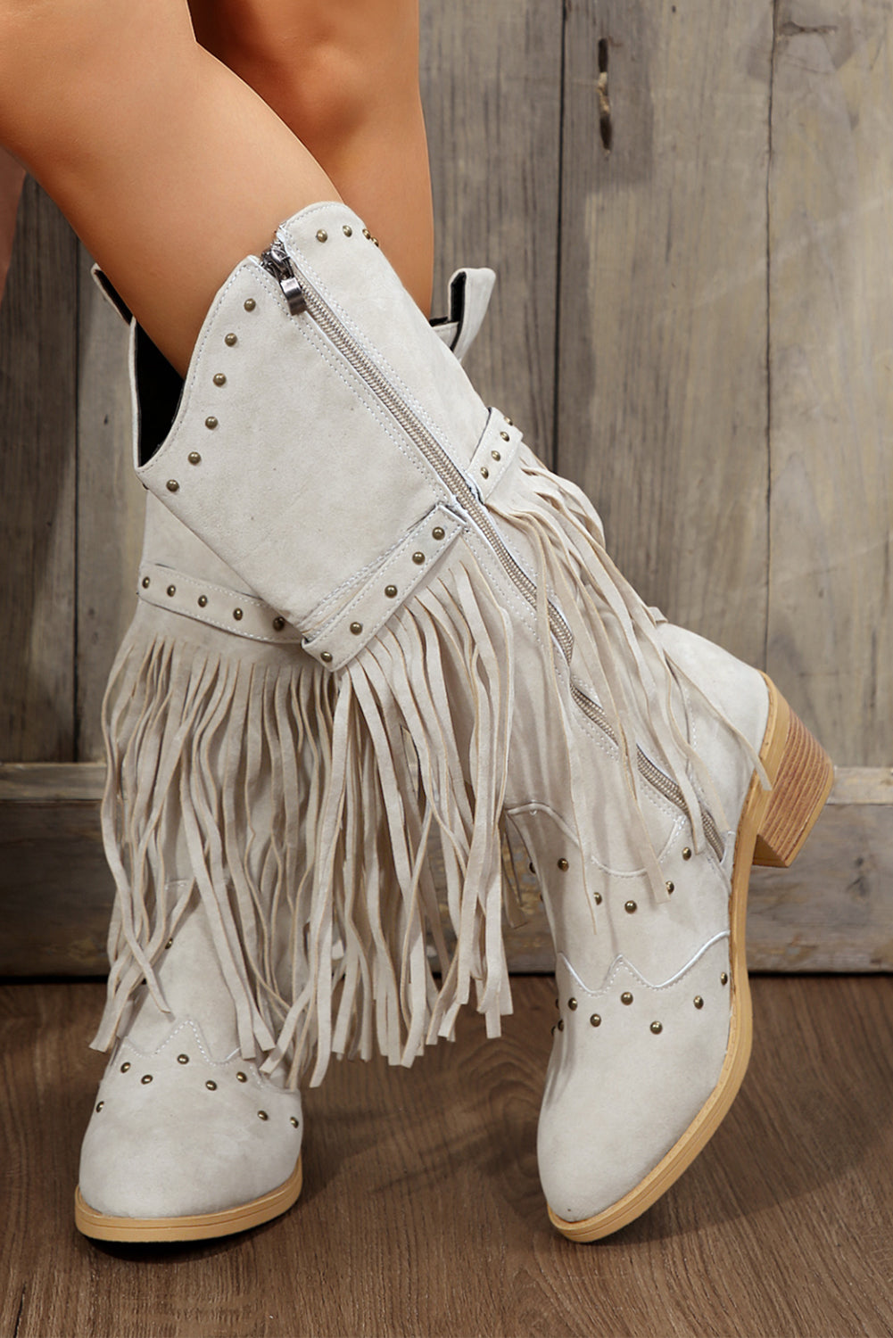 Jet Stream Faux Suede Studded Fringe Trim Heel Boots