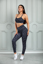 Load image into Gallery viewer, Leopard Cutout Sports Bra and Leggings Set
