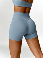 Load image into Gallery viewer, Twisted High Waist Active Shorts with Pockets
