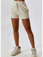 Load image into Gallery viewer, Drawstring Smocked Waist Sports Shorts
