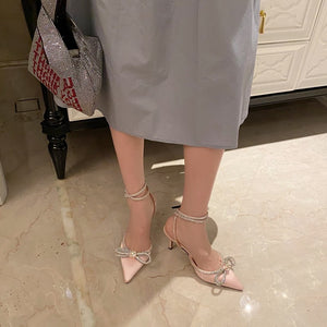 Butterfly-Knot Pointed Toe Pumps